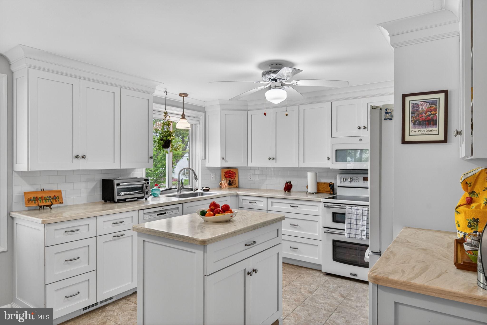 102 East Third Avenue Lititz, PA 17543 - Photo 10 of 45 a kitchen with a white cabinets and window