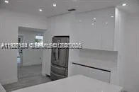 a room with table and chandelier