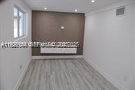 261 Northwest 46th Avenue, Unit 1 Miami, FL 33126 - Photo 4 of 10 a view of a hallway