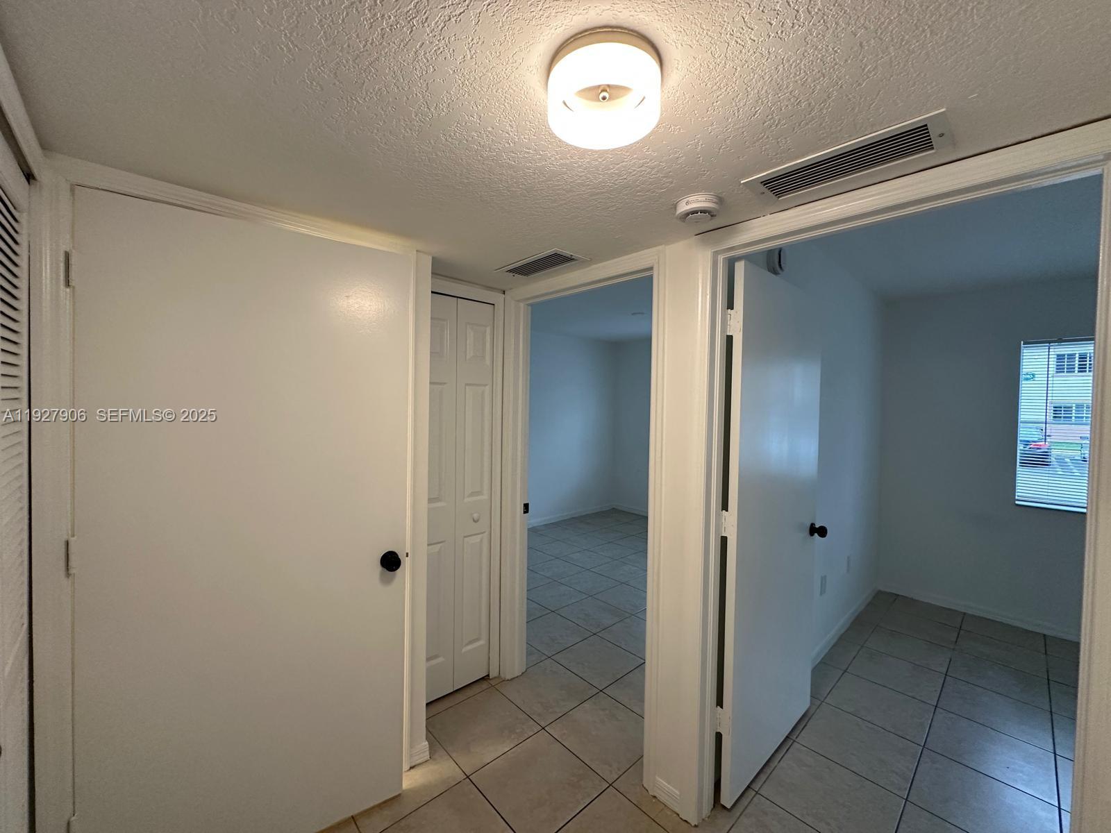 2911 Southeast 13th Road, Unit 10140 Homestead, FL 33035 - Photo 17 of 22 a view of an empty room
