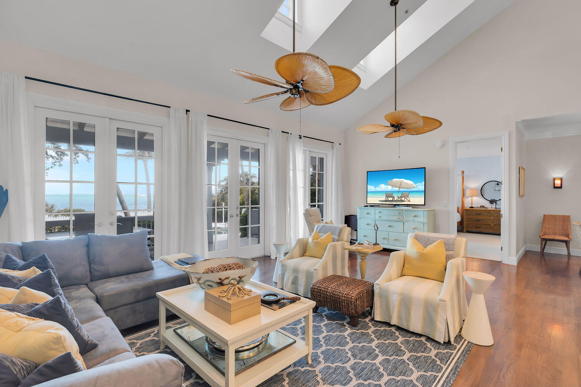 5 Sunset Key Drive Key West, FL 33040 - Photo 12 of 47 a living room with furniture a dining table and a large window