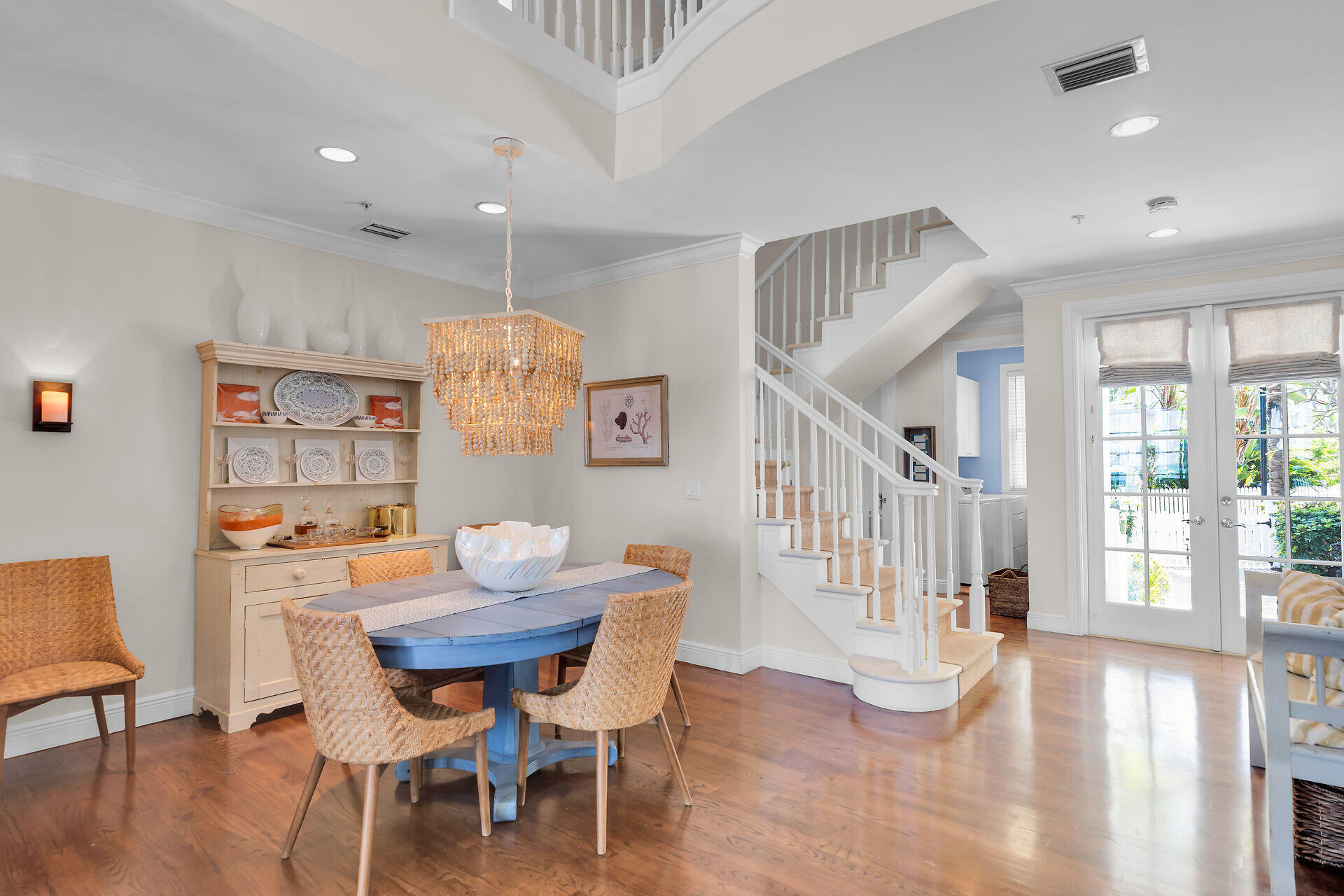 5 Sunset Key Drive Key West, FL 33040 - Photo 27 of 47 a view of a dining room with furniture wooden floor and chandelier