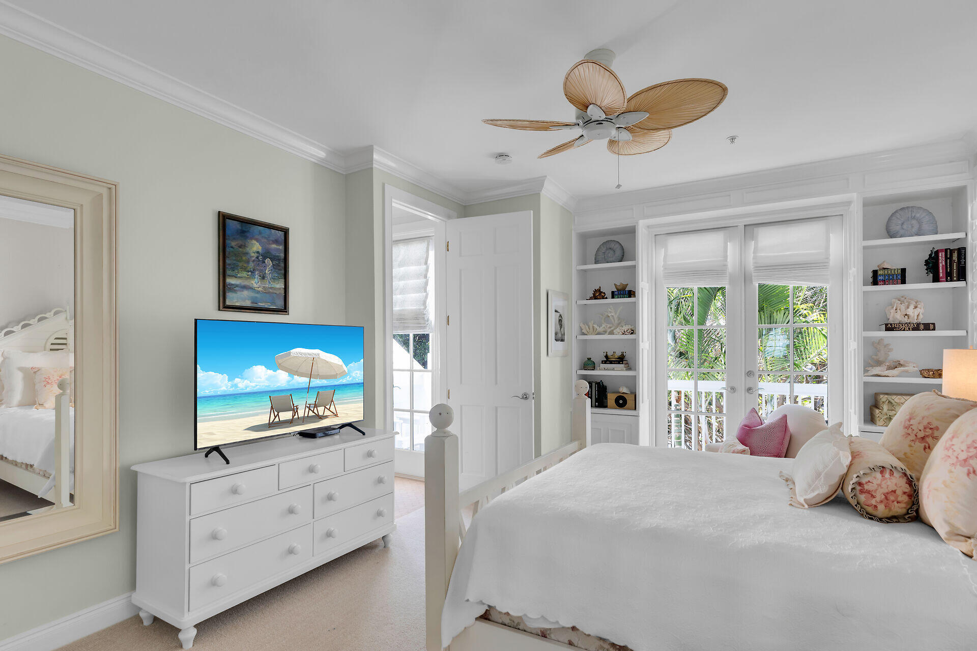 5 Sunset Key Drive Key West, FL 33040 - Photo 31 of 47 a bedroom with a bed closet and flat tv screen