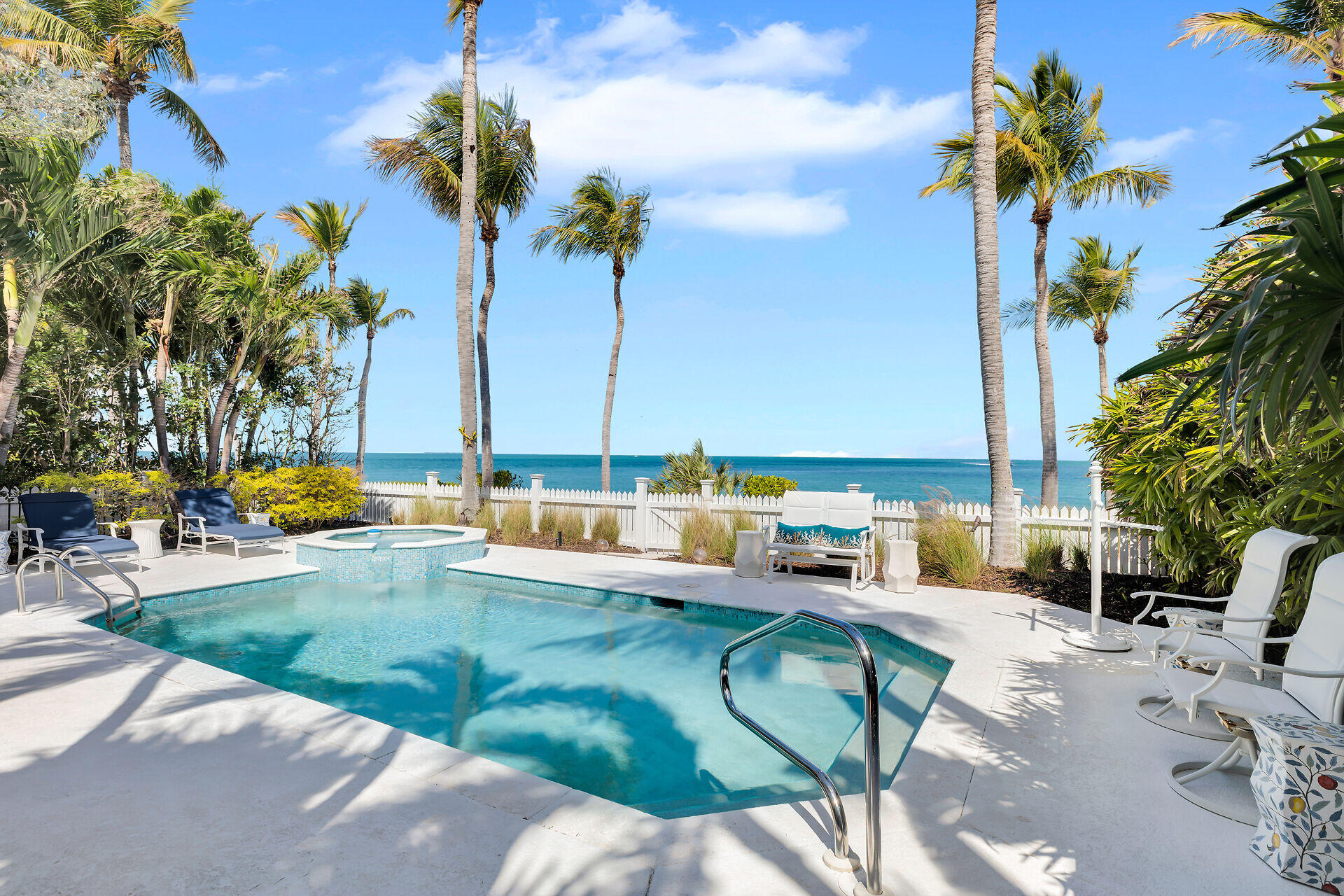 5 Sunset Key Drive Key West, FL 33040 - Photo 6 of 47 a view of swimming pool with chairs