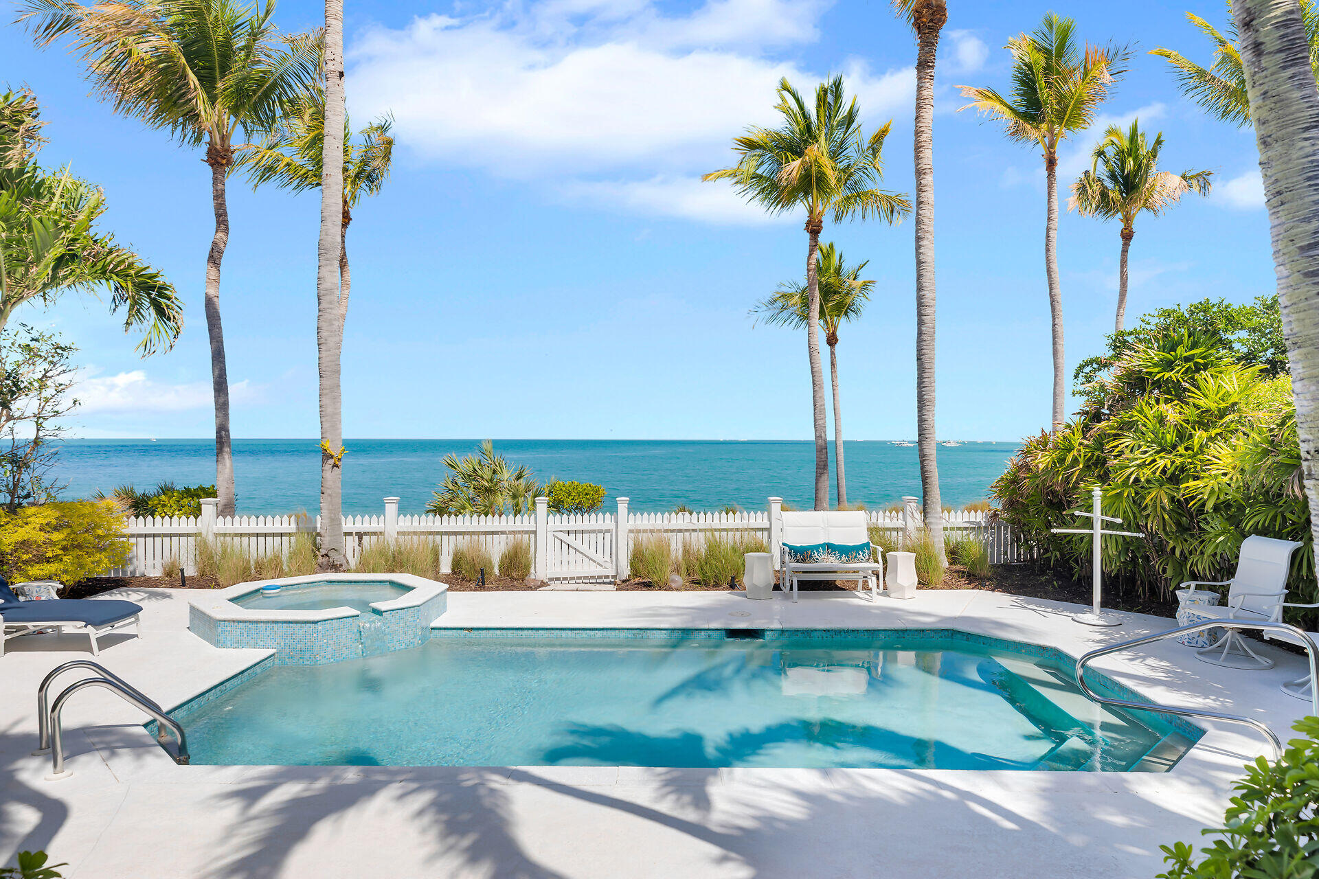 5 Sunset Key Drive Key West, FL 33040 - Photo 7 of 47 a view of a swimming pool with a patio