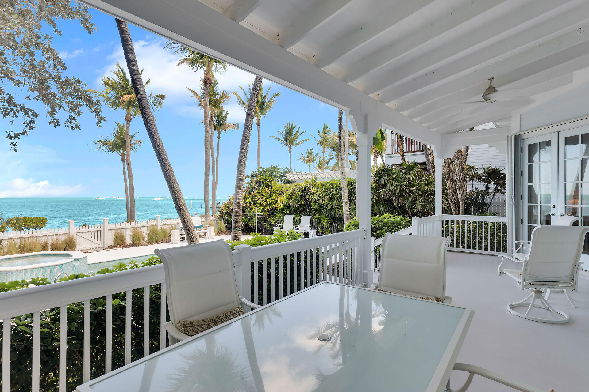 5 Sunset Key Drive Key West, FL 33040 - Photo 9 of 47 a view of a porch with furniture