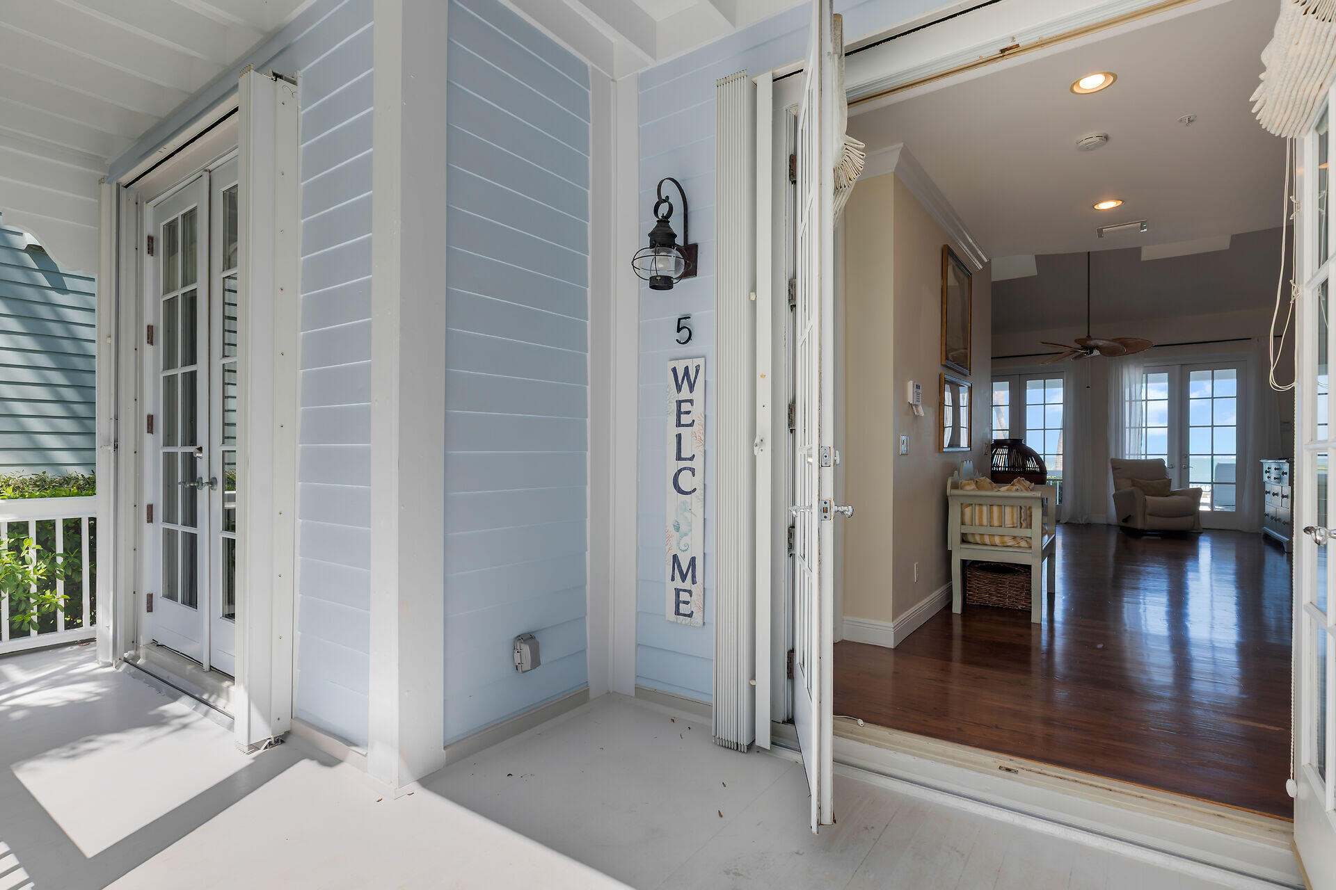 5 Sunset Key Drive Key West, FL 33040 - Photo 10 of 47 a view of a hallway with dining room and wooden floor