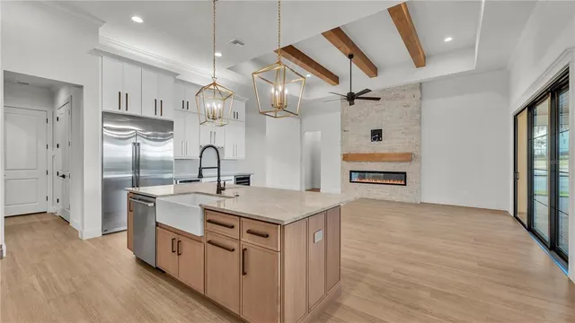 a view of kitchen and windows