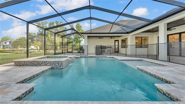 a view of a backyard with a table and chair