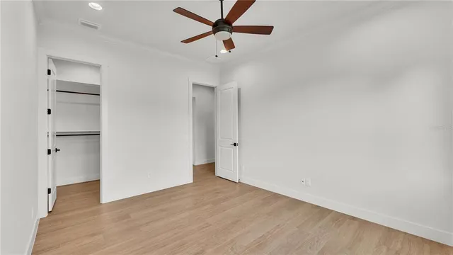 a view of a hallway with washer and dryer