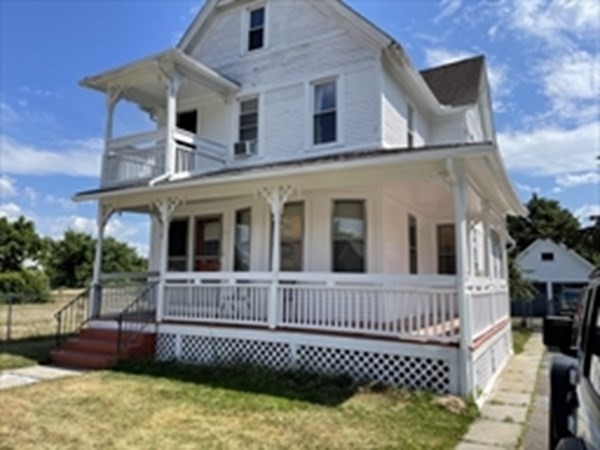 89-91 Ashley Street Springfield, MA 01105 - Photo 2 of 26 front view of a house with a yard