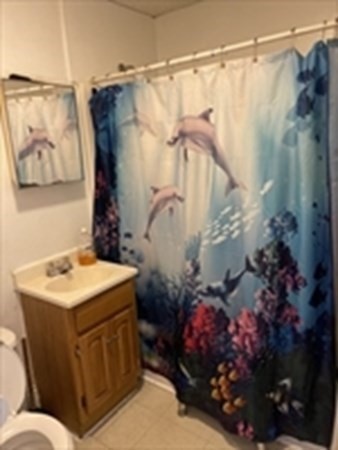 89-91 Ashley Street Springfield, MA 01105 - Photo 23 of 26 a bathroom with a sink toilet and shower