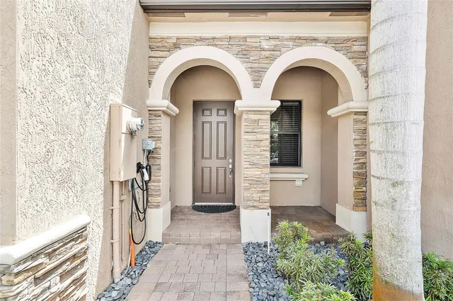 a view of a car parked in front of house