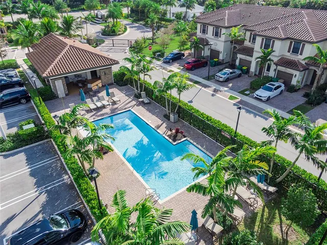 a view of a backyard with a sitting area and furniture