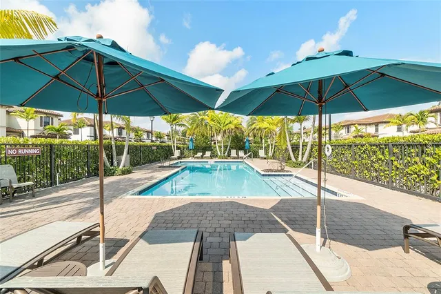 a view of a street with a building in the background