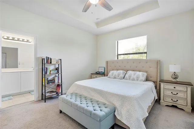 a bedroom with a bed and a walk in closet