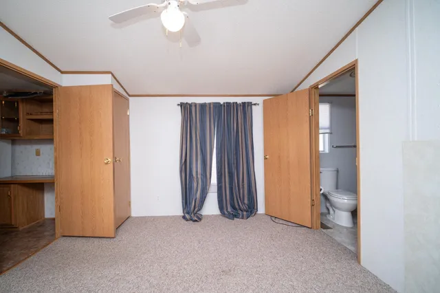 a view of a room with a flat screen tv