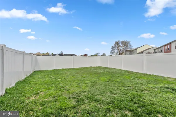 a view of a big yard next to a building
