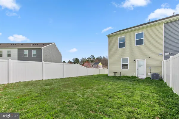a view of a backyard of house