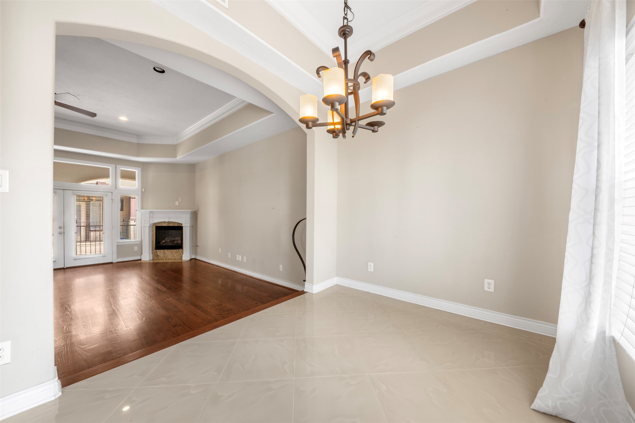 6524 Calder Street Houston, TX 77007 - Photo 12 of 28 wooden floor in an empty room with a window