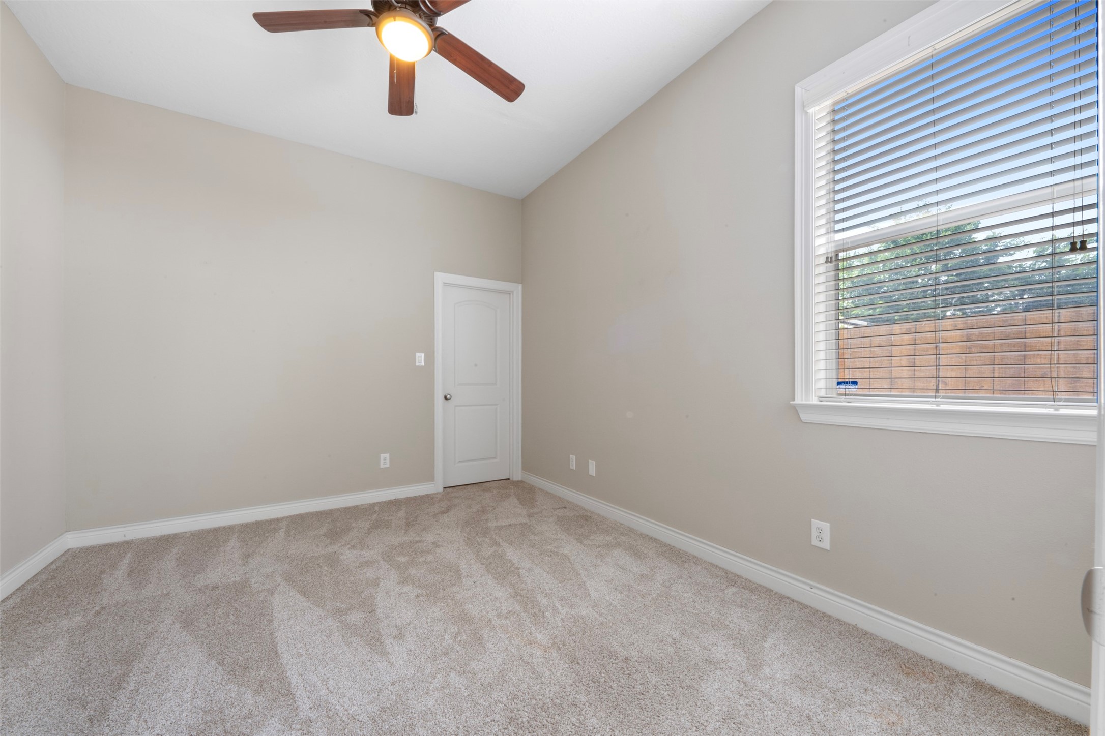 6524 Calder Street Houston, TX 77007 - Photo 20 of 28 a view of an empty room with a window