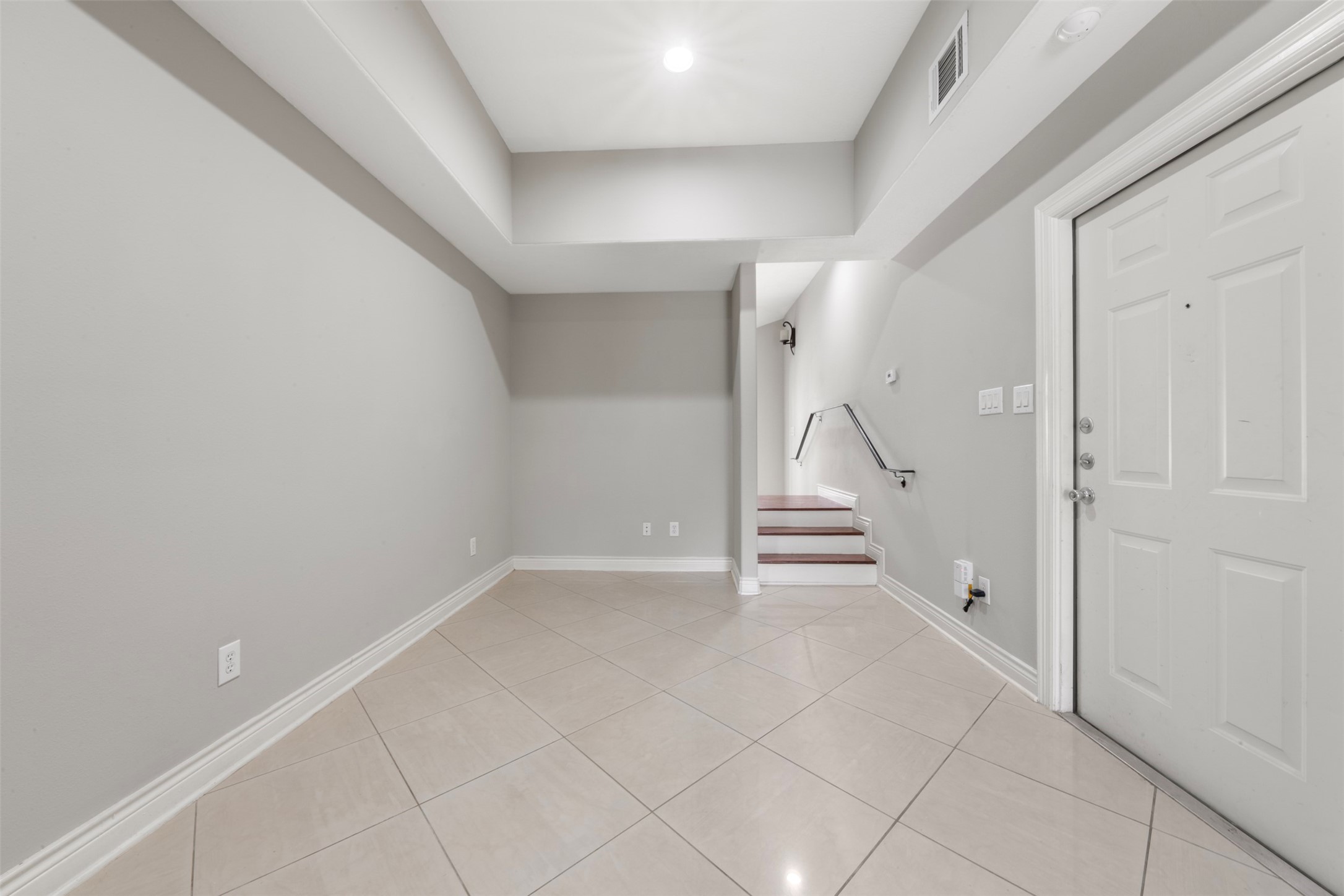 6524 Calder Street Houston, TX 77007 - Photo 21 of 28 wooden floor in an empty room with a window