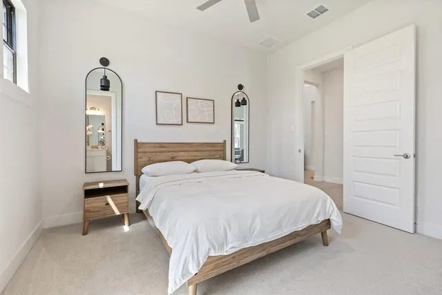 a bedroom with a bed and a closet