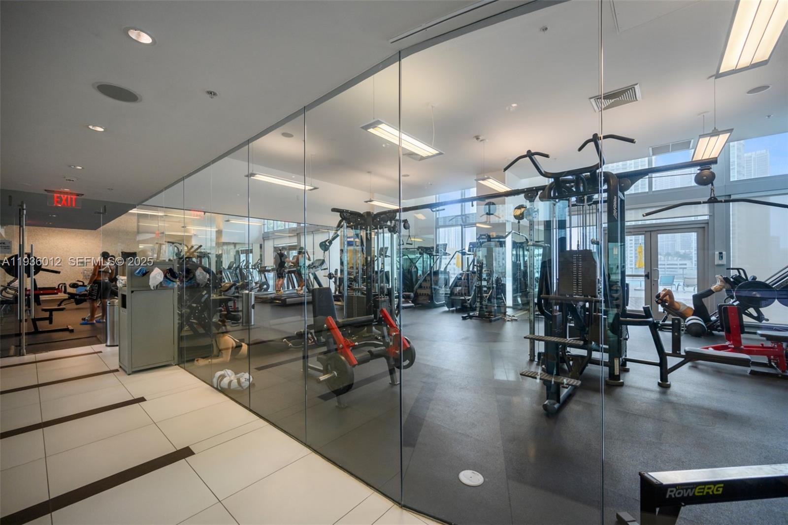 92 Southwest 3rd Street, Unit 3902 Miami, FL 33130 - Photo 18 of 21 a view of a room with gym equipment
