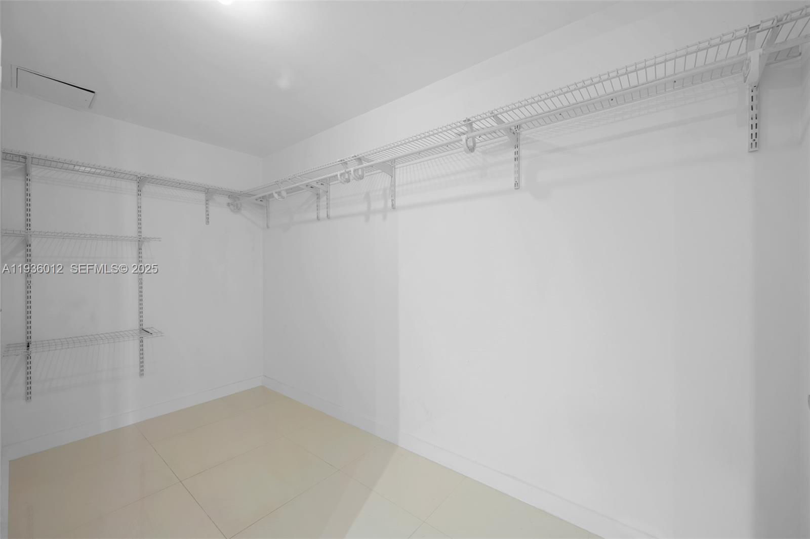 92 Southwest 3rd Street, Unit 3902 Miami, FL 33130 - Photo 9 of 21 a view of a room with shelf