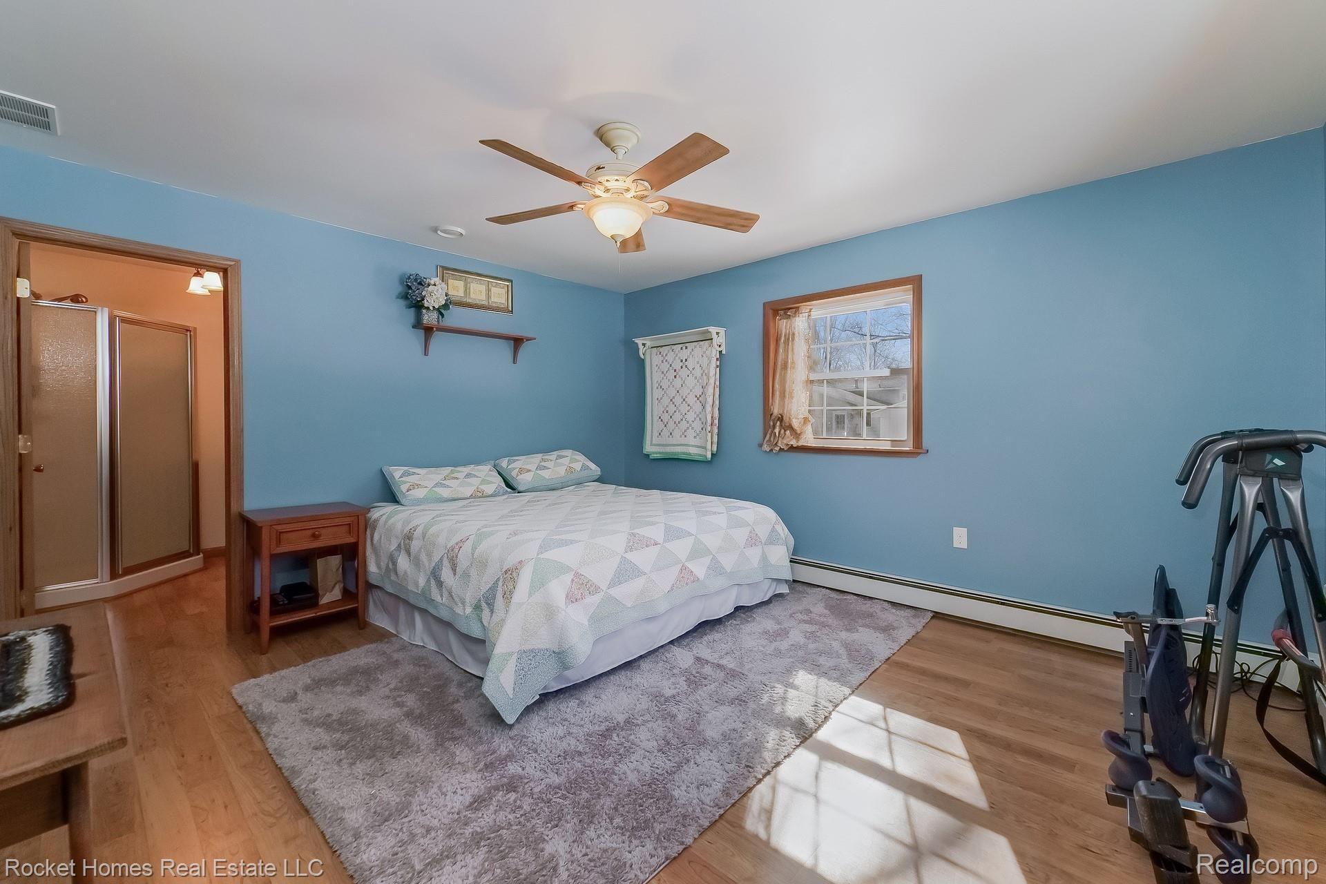 12792 Budd Road Burt, MI 48417 - Photo 16 of 42 015-photo-main-bedroom-8986949.jpg