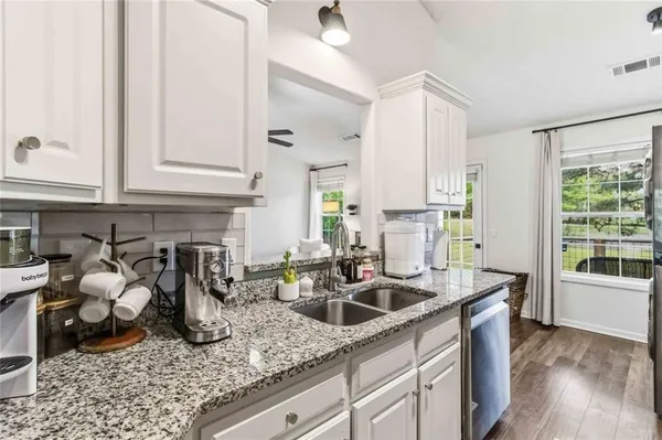 a view of a field with an trees