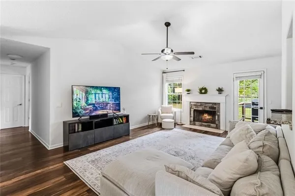 a living room with furniture and a window