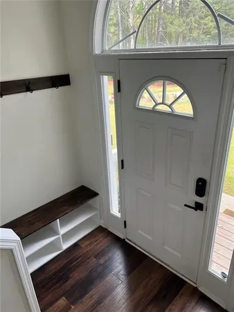 a stove top oven sitting inside of a kitchen