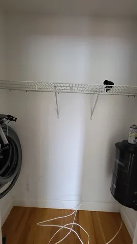 a view of a room with racks on the wall