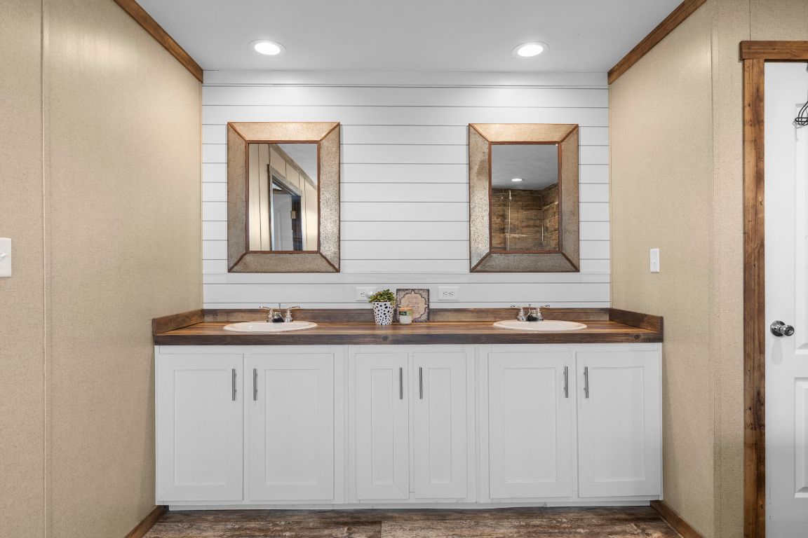 498 William Pettus Road Maxwell, TX 78656 - Photo 13 of 27 a bathroom with mirror and sink