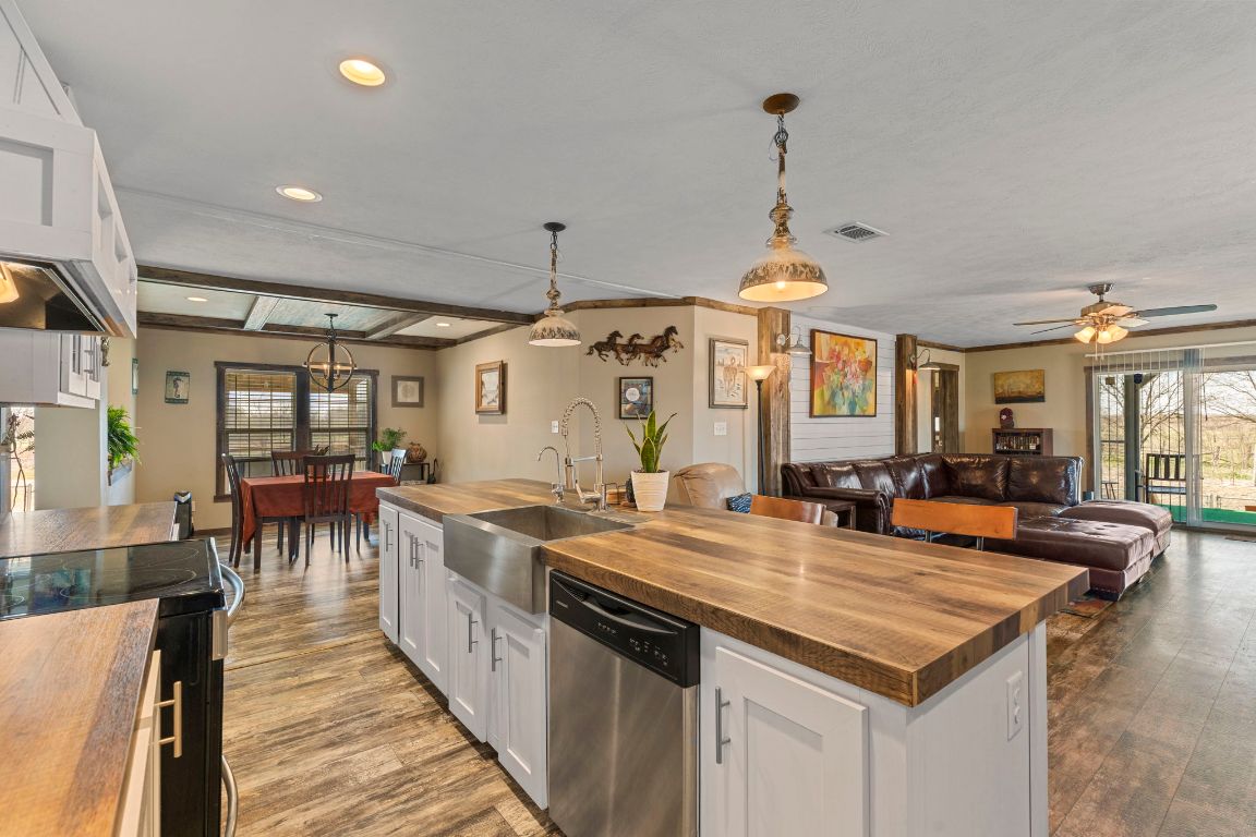 498 William Pettus Road Maxwell, TX 78656 - Photo 27 of 27 a kitchen with stove and refrigerator