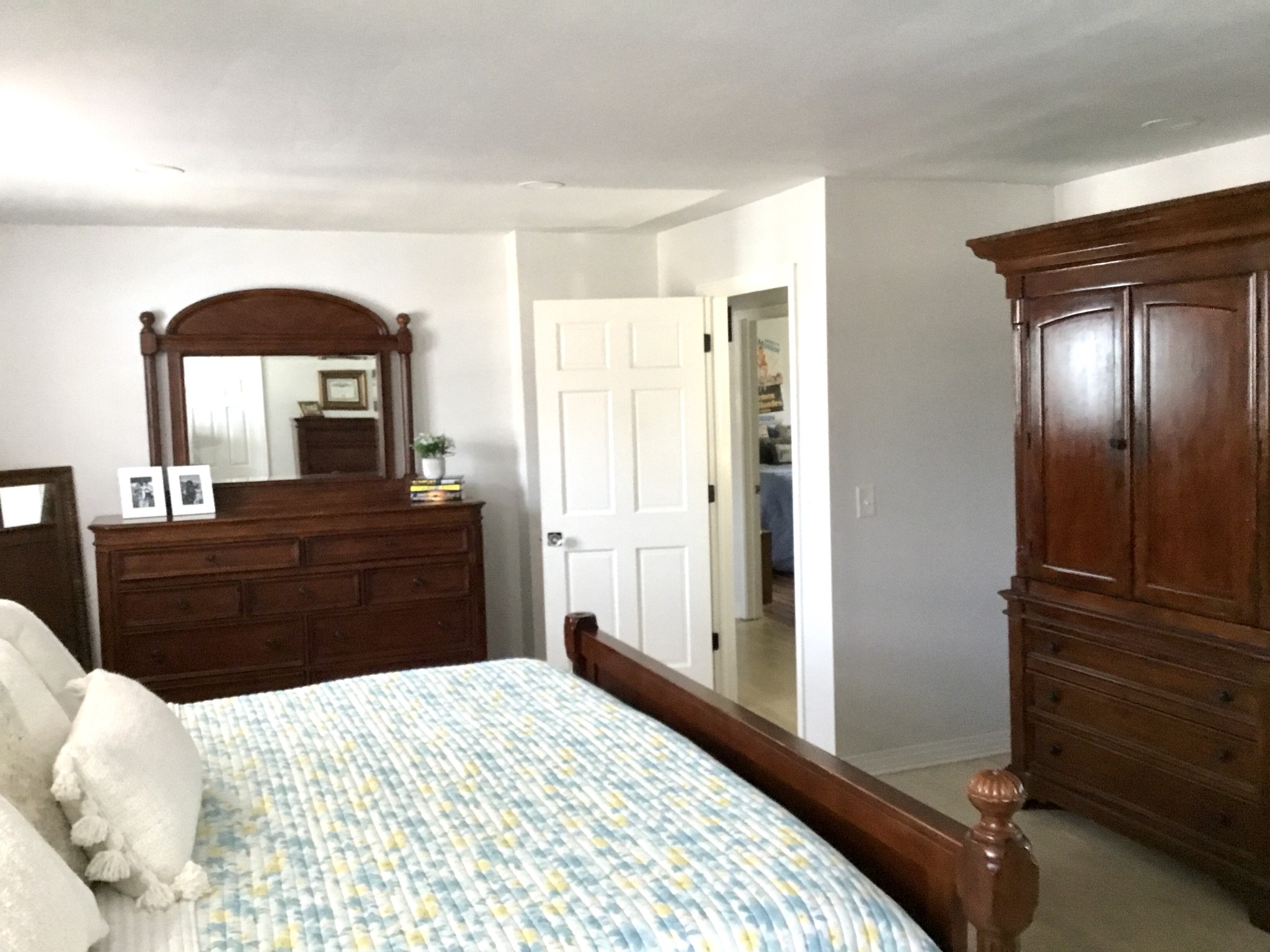 401 Bumpas Road Lawrenceburg, TN 38464 - Photo 26 of 58 a bedroom with a bed and a dresser