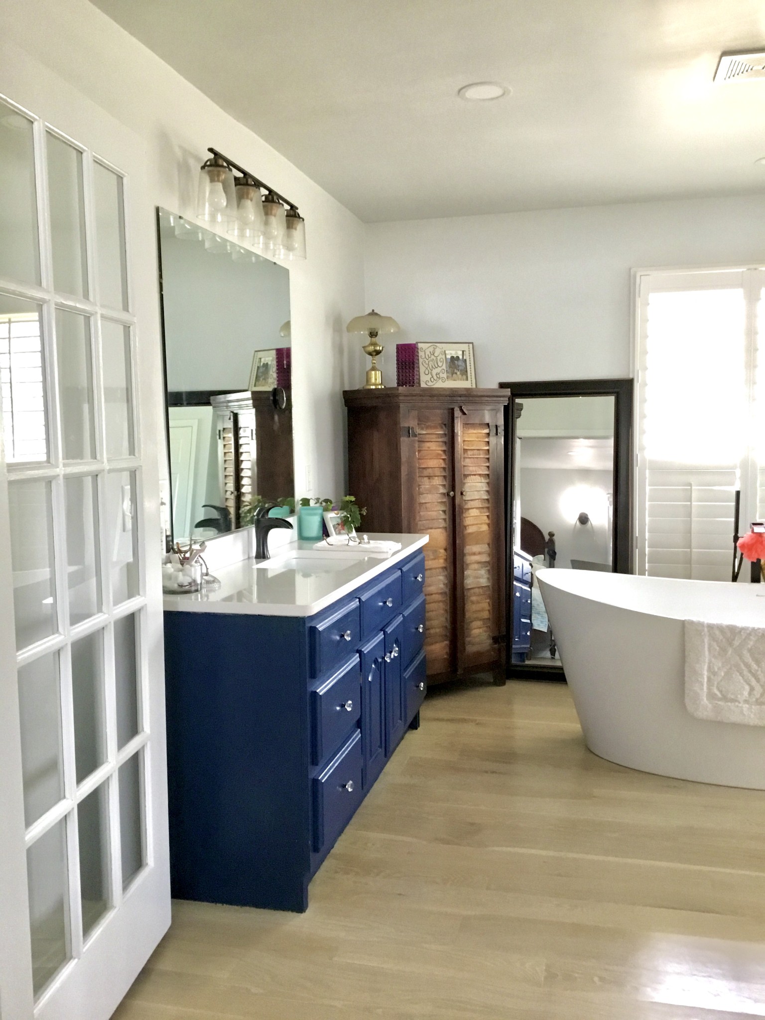 401 Bumpas Road Lawrenceburg, TN 38464 - Photo 27 of 58 a spacious bathroom with a tub double sink and mirror