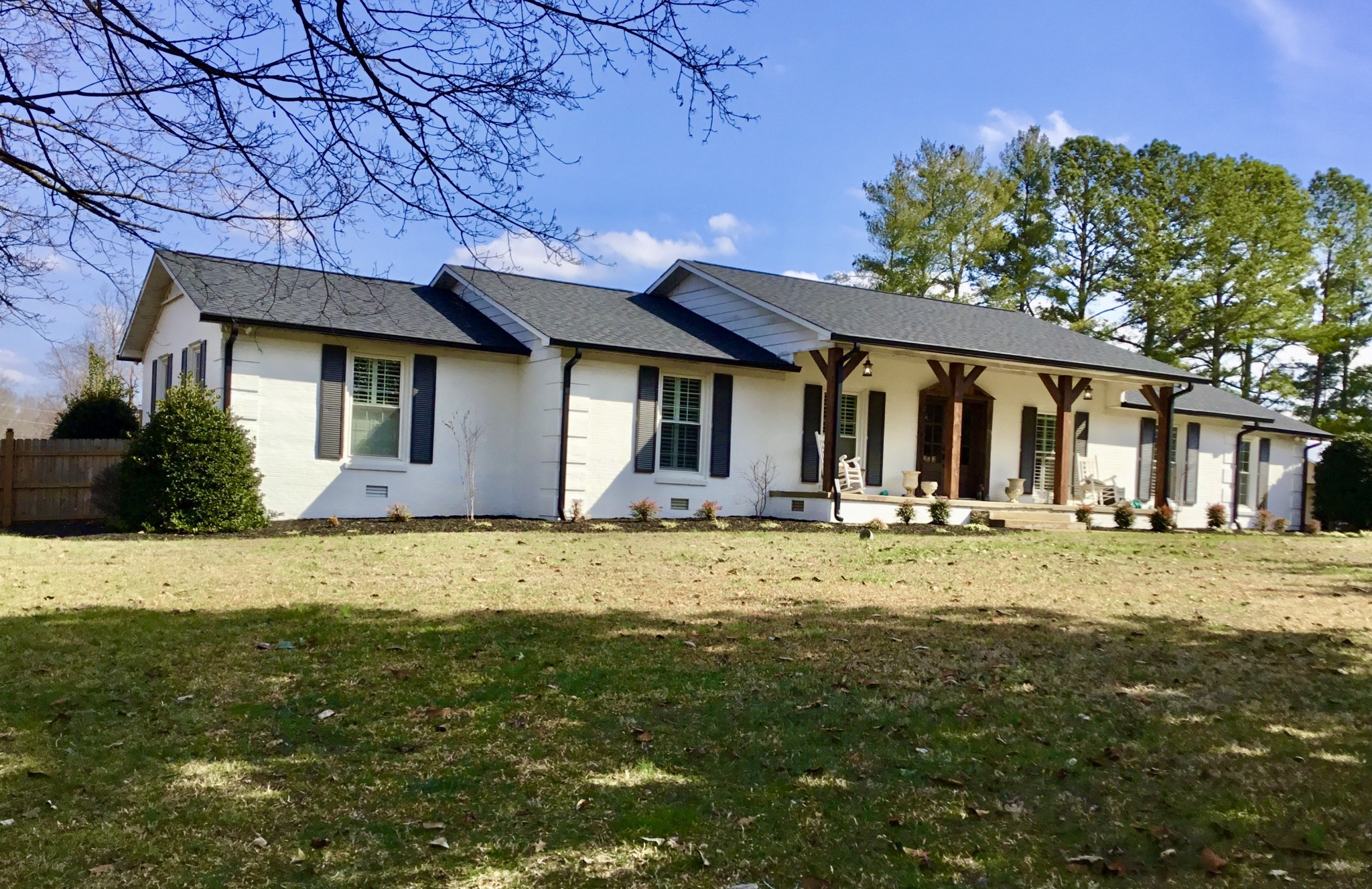 401 Bumpas Road Lawrenceburg, TN 38464 - Photo 4 of 58 a front view of a house with a garden