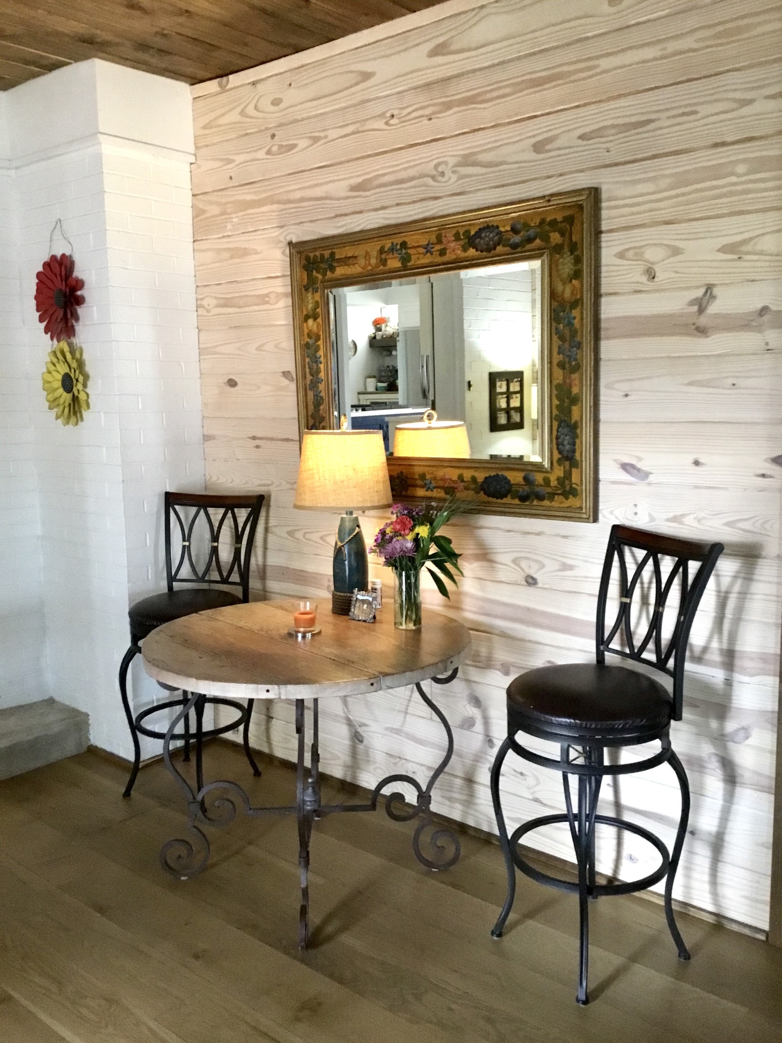 401 Bumpas Road Lawrenceburg, TN 38464 - Photo 44 of 58 a view of a dining room with furniture and a potted plant