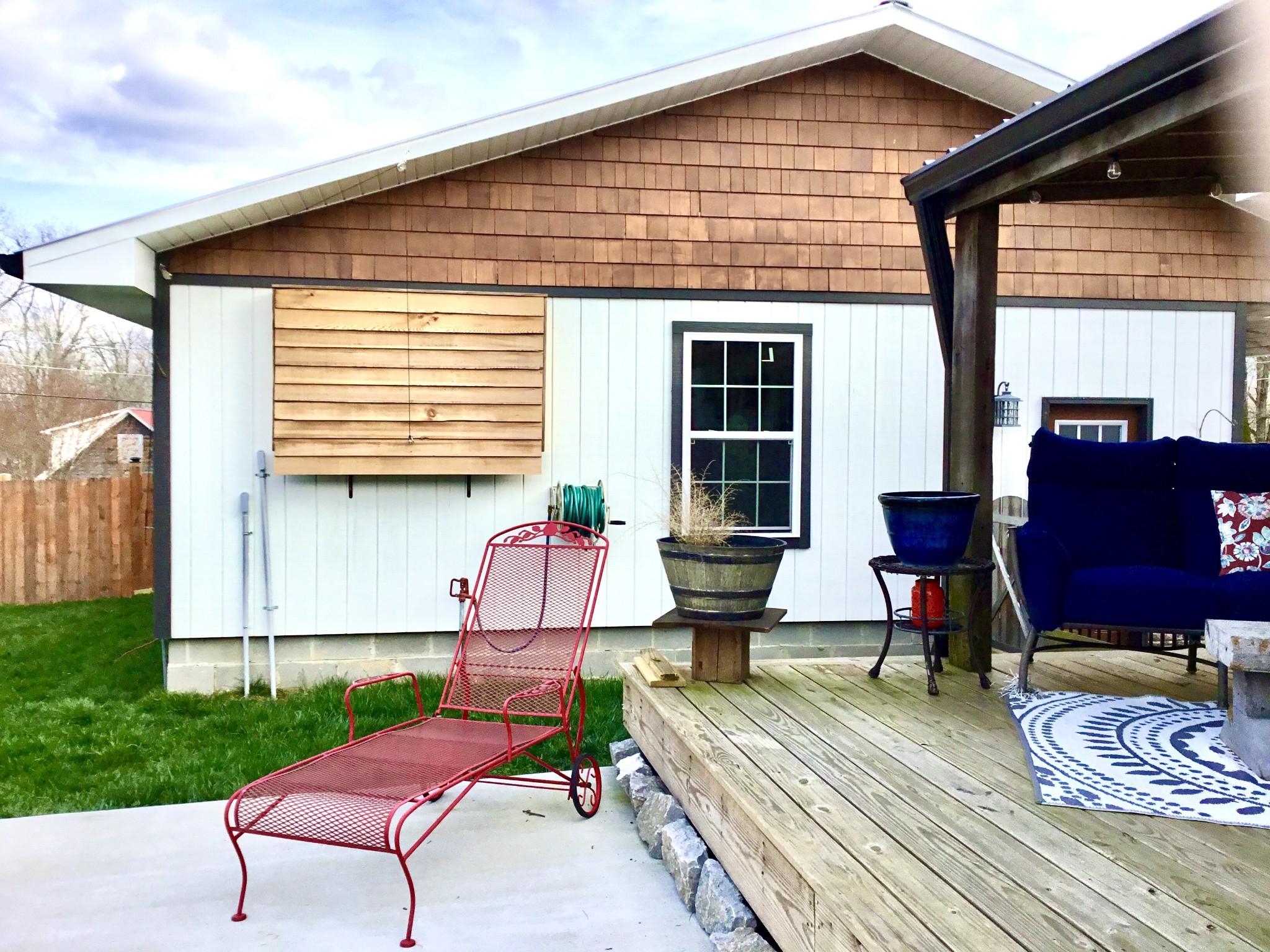 401 Bumpas Road Lawrenceburg, TN 38464 - Photo 49 of 58 a view of a chairs and table in the back yard of the house