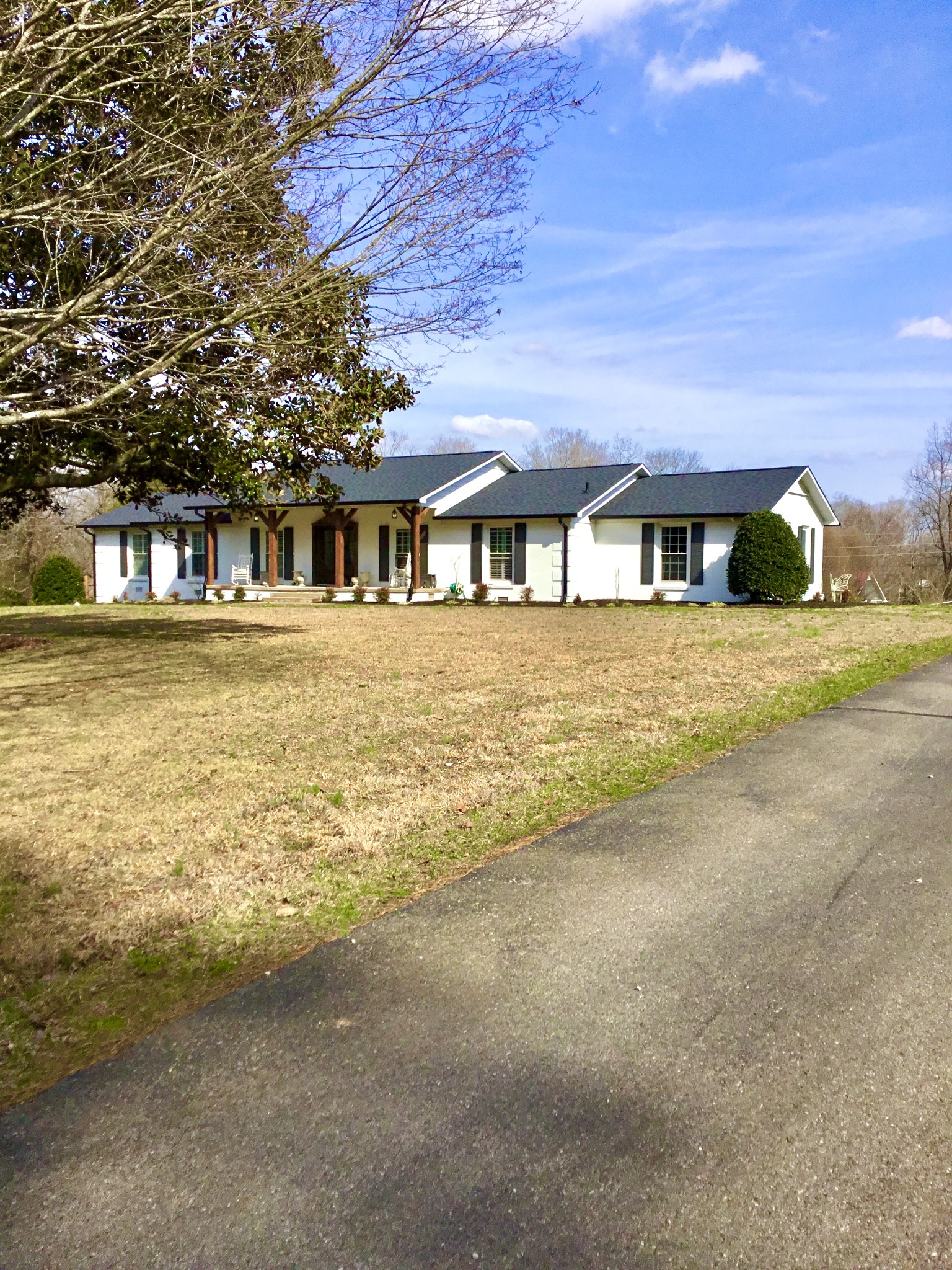 401 Bumpas Road Lawrenceburg, TN 38464 - Photo 5 of 58 a front view of house with yard