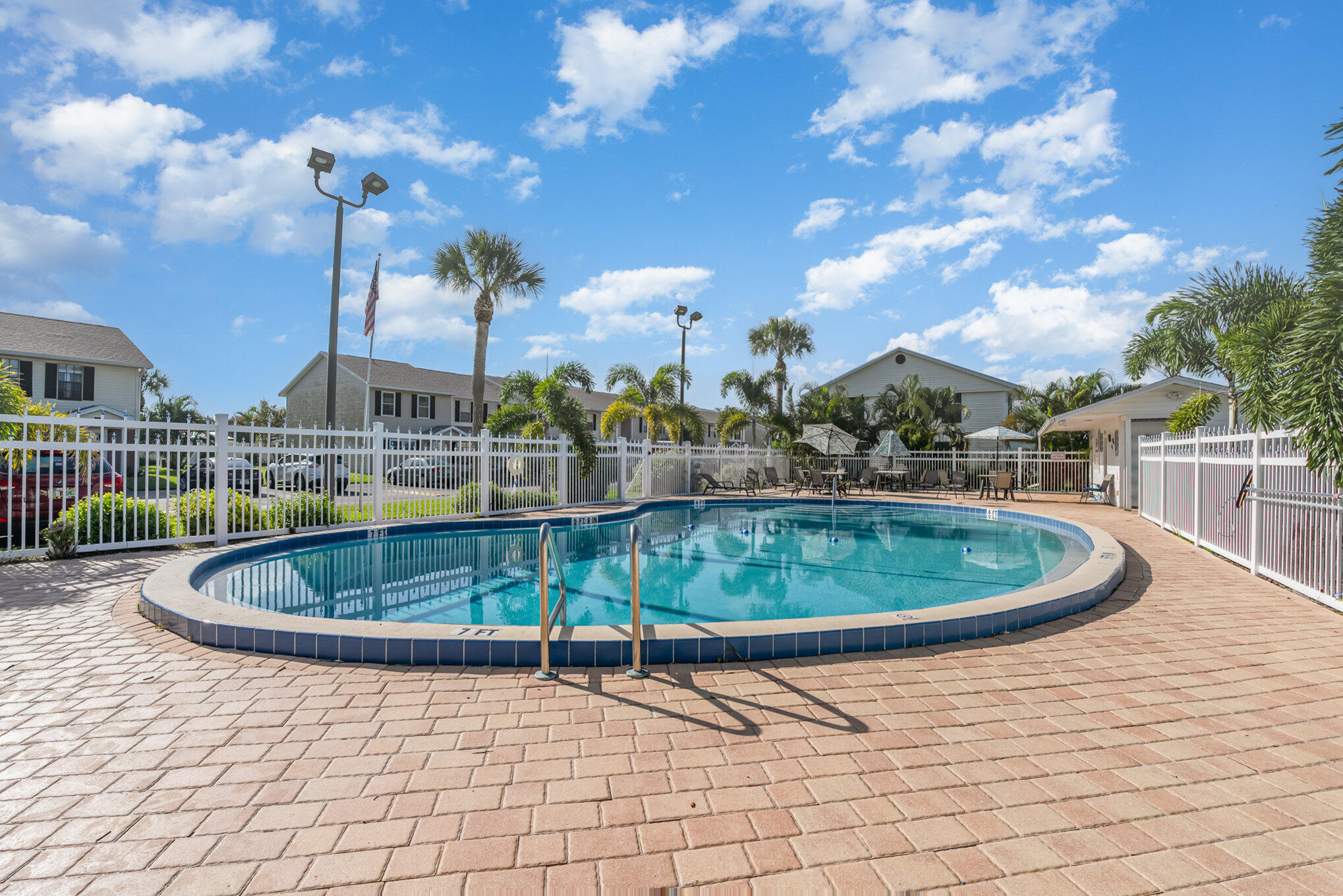 3118 Manor Drive Northeast Palm Bay, FL 32905 - Photo 22 of 22 a view of outdoor space swimming pool and lake view