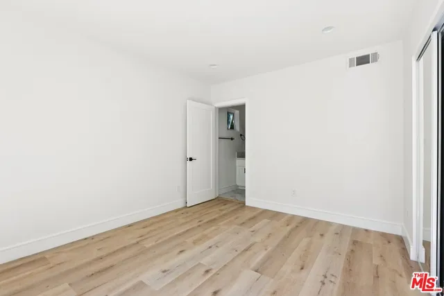 a bathroom with a toilet sink and a shower