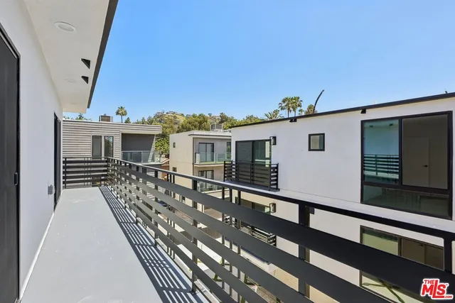 a view of a building from a balcony
