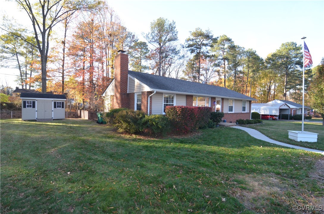 9712 Esmont Road Henrico, VA 23228 - Photo 21 of 21 Single story home featuring a front yard and a sto