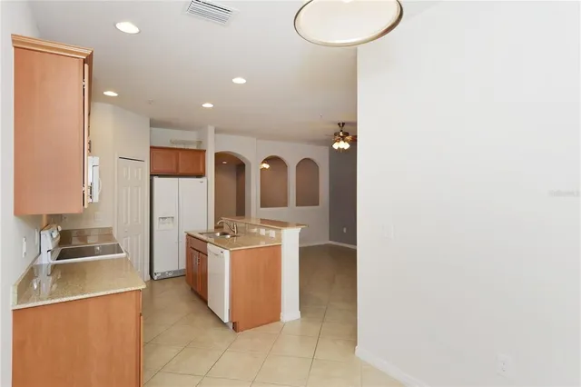 a view of a kitchen with a sink
