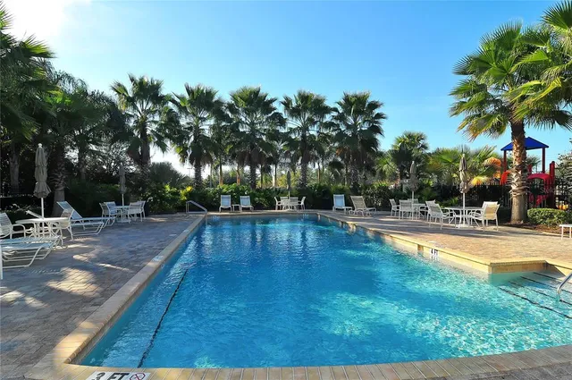 swimming pool with outdoor seating