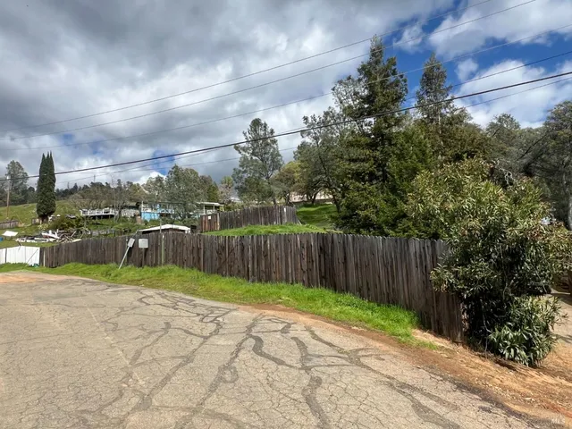 a view of swimming pool with a yard