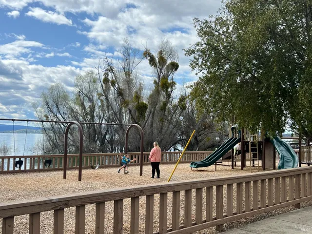 a balcony view with a garden